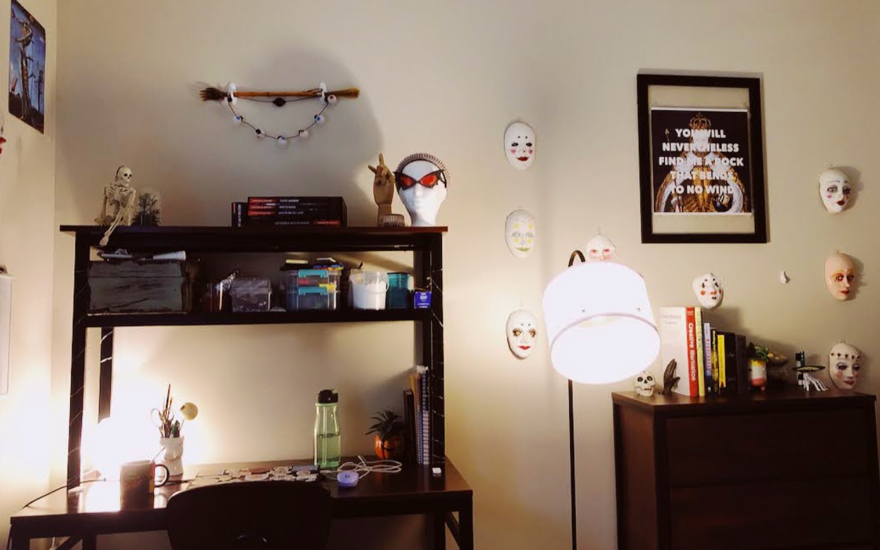 University Edge dorm room with decorated walls and posters