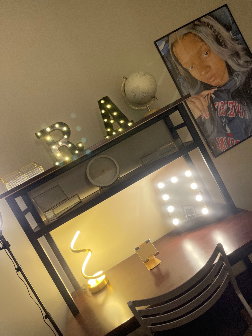 Desk with decorative lights and pictures