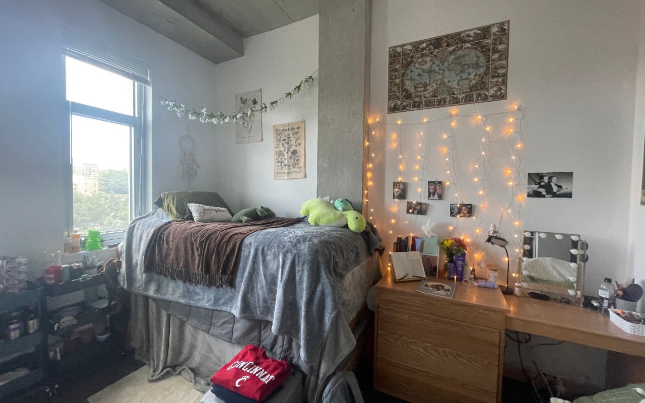 Marian Spencer Dorm room with decorated bed and desk with lighting